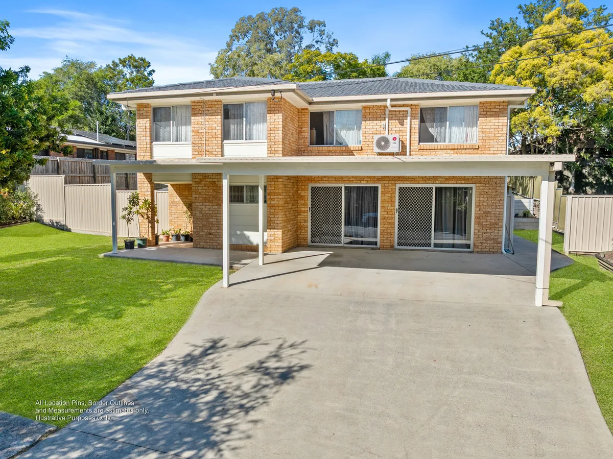 TWO STOREY BRICK HOME WITH DUAL LIVING POTENTIAL